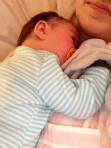 He got his shots at his 4 month well visit at the doctor so we spent all day Monday in our jammies cuddling in the big bed and watching the DVR and taking baby tylenol every 4 hours (a little but for baby, a lot a bit for mommy).