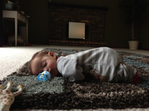 Morning nap in our (still) unfurnished family room with his butt up in the air.  Sidenote: our new couches should be here the first week in may- FINALLY