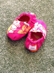 The first output from my new craft room: baby TOMS (which are shoes) for a friend of mine who is expecting any minute now!  Even made with custom tags for Liesel (what they will name her).  Between these and my diaper cakes, I should open an Etsy shop