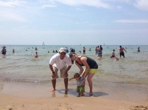 How I Spent My 4th of July: With the Gerstner Family on Lake Michigan.  Lucas was clearly too interested in the sand to look at the camera, but we'll work on it