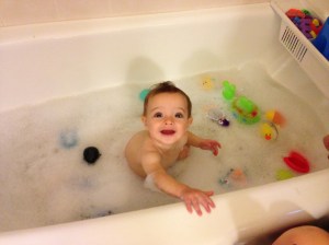 I believe that all inappropriate body parts are covered, so here is the traditional baby in the bubble bath photo that every parent (and now myself) has for future blackmail. 