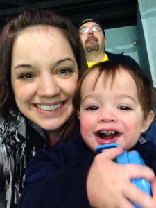 Watching basketball with my sidekick and his snack cup
