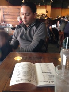 Lucas is running around on the floor at his feet